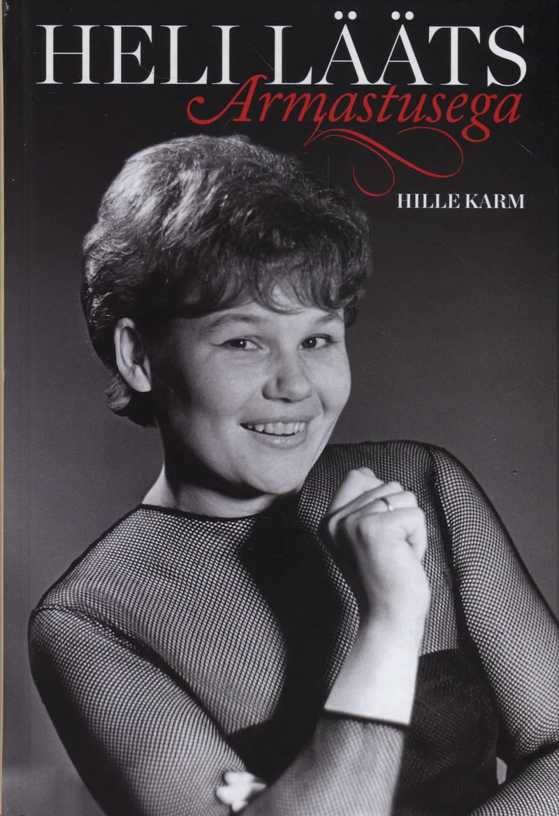 Heli Lääts - Hille Karm, Heli Lääts (SE & JS, 2017). Mustvalge portreefoto noorest naeratavast naisest, kes kannab võrksärki ja hoiab käed risti ees. Foto on klassikalises 1960ndate stiilis.