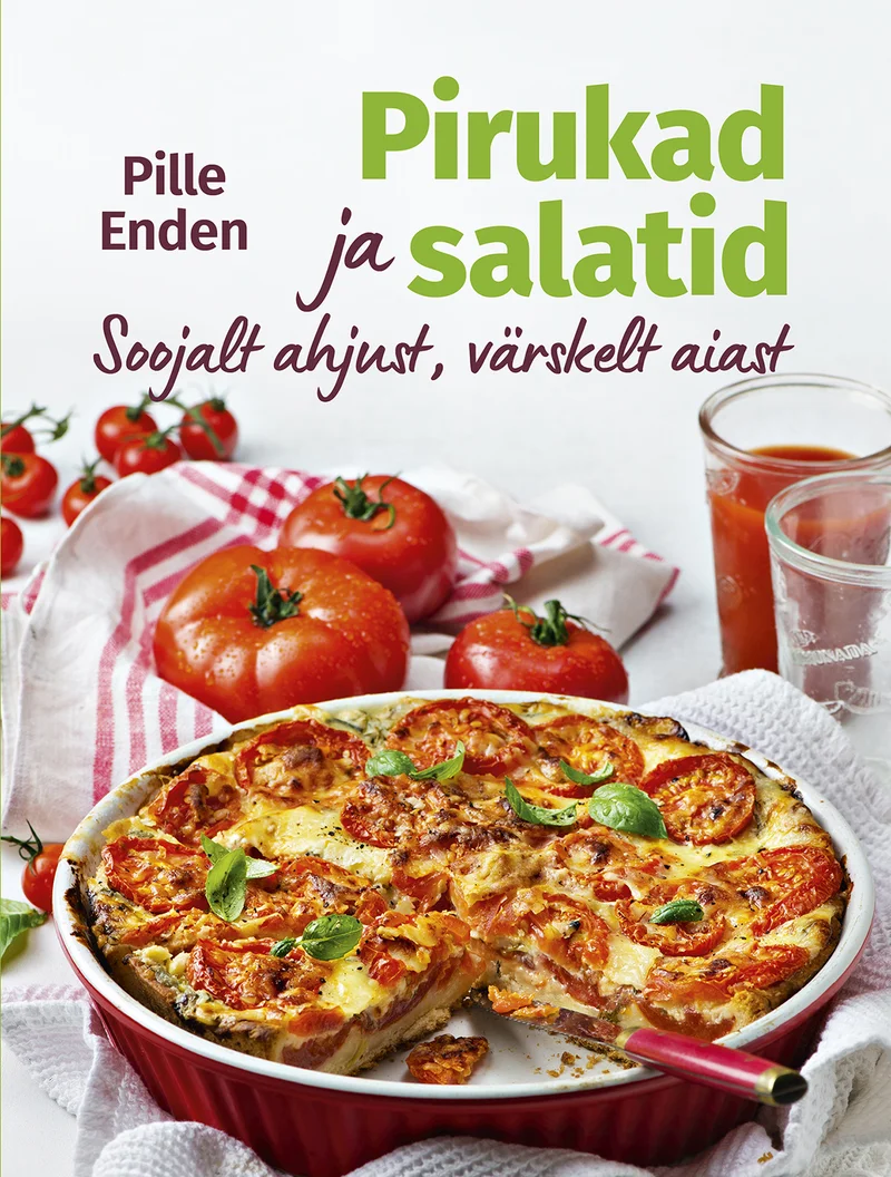 Pirukad ja salatid - Pille Enden. Fotorealistlik toidufotograafia heledal taustal, kus esikohal on roosakas küpsetusvorm kuldpruuni koorikuga pirukas. Taustal on värskeid tomateid ja klaas, mis loovad maitseka koduse õhkkonna.